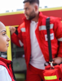 paramedic-nurse-emergency-doctor-ambulance-with-kit-paramedic-standing-rear-ambulance-by-open-doors-1-3.jpg